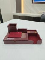 Office Desk Top Premium Pen Stand In Maroon Color Made Wooden Piece With Leather Cover - Bhandari Stationers Kota